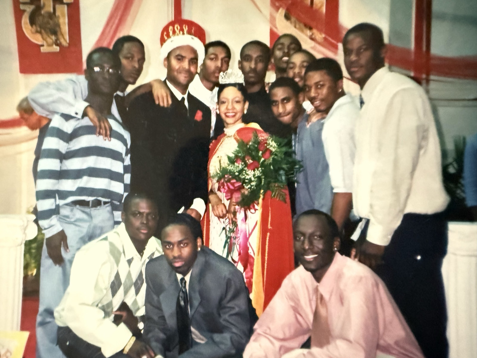 The partners as Tuskegee students, gathered together at a campus coronation event